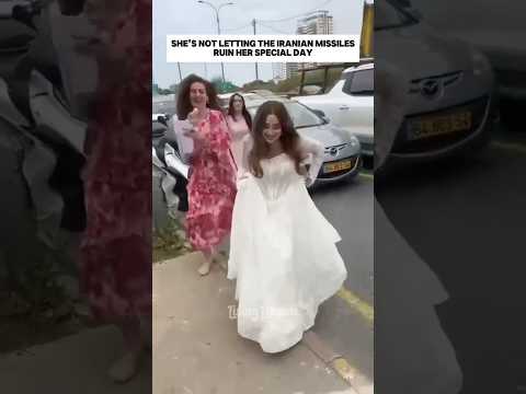 Israeli bride RUNS to shelter on her wedding day as Iran missiles come